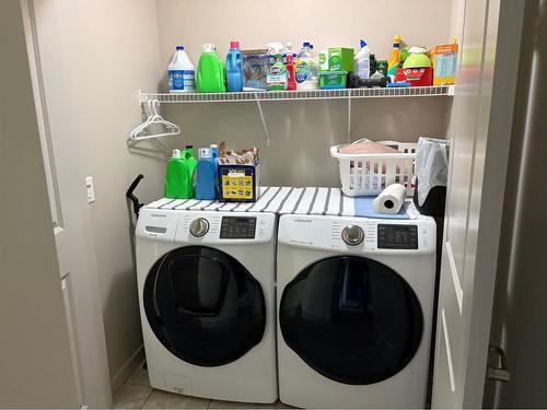 91 Evanscrest Way Nw, Calgary, AB - Indoor Photo Showing Laundry Room