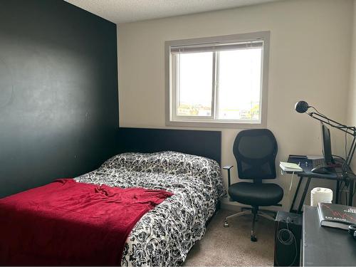 91 Evanscrest Way Nw, Calgary, AB - Indoor Photo Showing Bedroom