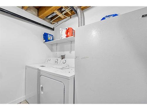 302 Adams Crescent Se, Calgary, AB - Indoor Photo Showing Laundry Room