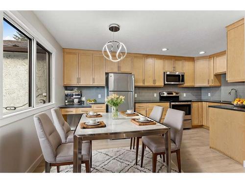 17 Deer Lane Road Se, Calgary, AB - Indoor Photo Showing Kitchen With Stainless Steel Kitchen