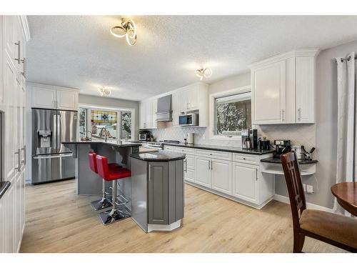 131 Shawcliffe Circle Sw, Calgary, AB - Indoor Photo Showing Kitchen With Stainless Steel Kitchen With Upgraded Kitchen