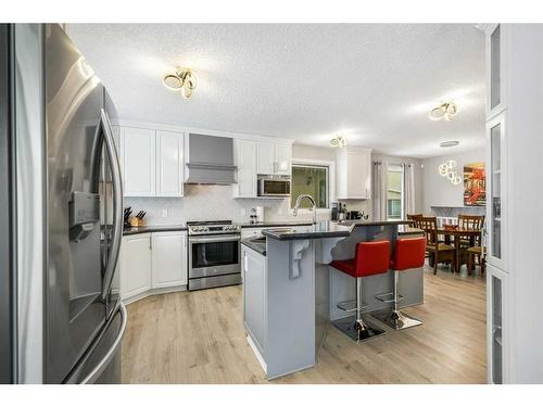 131 Shawcliffe Circle Sw, Calgary, AB - Indoor Photo Showing Kitchen With Stainless Steel Kitchen With Upgraded Kitchen