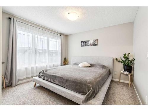 8113 Masters Boulevard Se, Calgary, AB - Indoor Photo Showing Bedroom