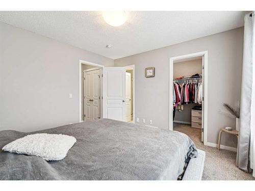 8113 Masters Boulevard Se, Calgary, AB - Indoor Photo Showing Bedroom