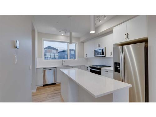 192 Hotchkiss Drive Se, Calgary, AB - Indoor Photo Showing Kitchen With Upgraded Kitchen