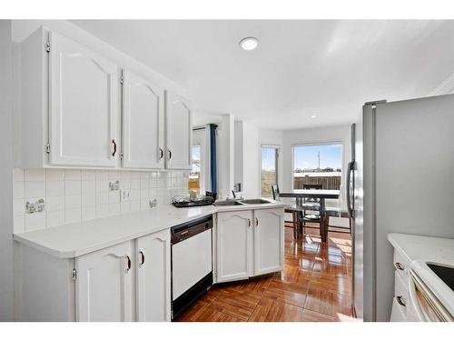 173 Coral Sands Place Ne, Calgary, AB - Indoor Photo Showing Kitchen With Double Sink