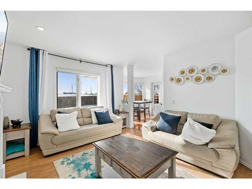 173 Coral Sands Place Ne, Calgary, AB - Indoor Photo Showing Living Room