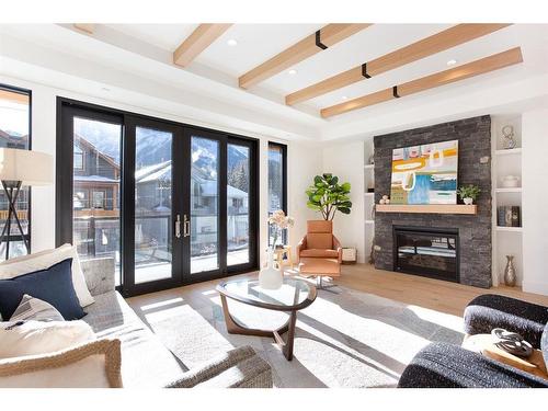 4 (Sw)-833 6Th Street, Canmore, AB - Indoor Photo Showing Living Room With Fireplace