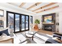 4 (Sw)-833 6Th Street, Canmore, AB  - Indoor Photo Showing Living Room With Fireplace 