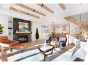 4 (Sw)-833 6Th Street, Canmore, AB  - Indoor Photo Showing Living Room With Fireplace 