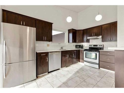 39 Hawksbrow Road Nw, Calgary, AB - Indoor Photo Showing Kitchen With Stainless Steel Kitchen