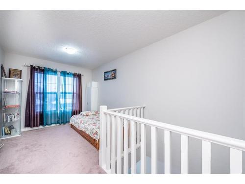 17 Red Embers Row Ne, Calgary, AB - Indoor Photo Showing Bedroom