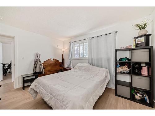 252 And 254 Midridge Place Se, Calgary, AB - Indoor Photo Showing Bedroom