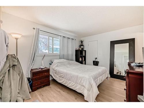 252 And 254 Midridge Place Se, Calgary, AB - Indoor Photo Showing Bedroom