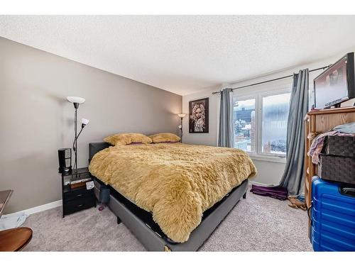 252 And 254 Midridge Place Se, Calgary, AB - Indoor Photo Showing Bedroom