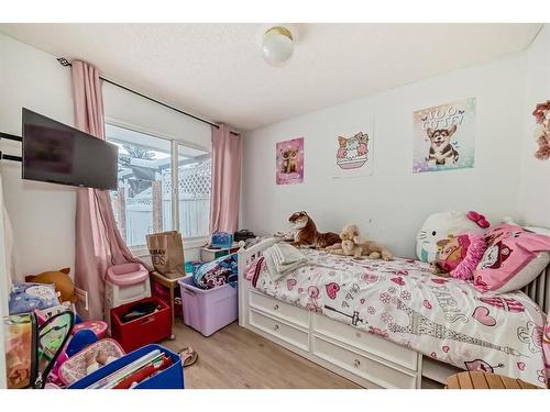 252 And 254 Midridge Place Se, Calgary, AB - Indoor Photo Showing Bedroom