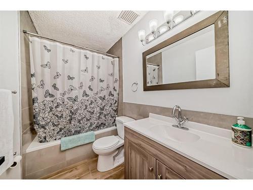 252 And 254 Midridge Place Se, Calgary, AB - Indoor Photo Showing Bathroom