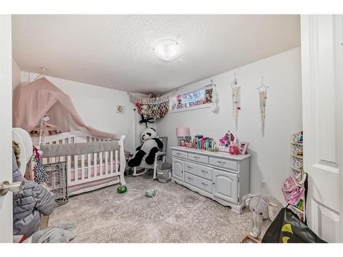 252 And 254 Midridge Place Se, Calgary, AB - Indoor Photo Showing Bedroom