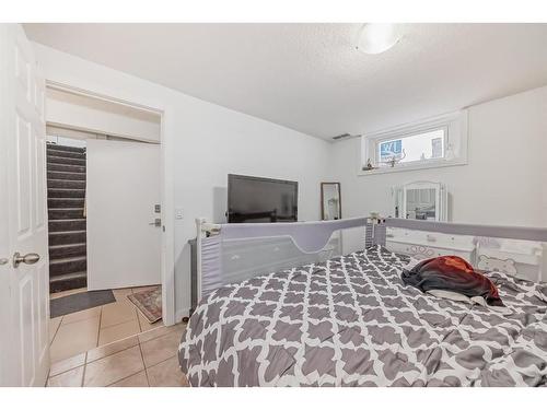 252 And 254 Midridge Place Se, Calgary, AB - Indoor Photo Showing Bedroom