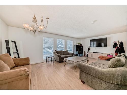 252 And 254 Midridge Place Se, Calgary, AB - Indoor Photo Showing Living Room