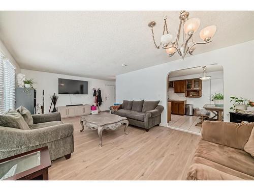 252 And 254 Midridge Place Se, Calgary, AB - Indoor Photo Showing Living Room