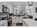 302 Corner Glen Circle Ne, Calgary, AB  - Indoor Photo Showing Kitchen With Stainless Steel Kitchen With Upgraded Kitchen 