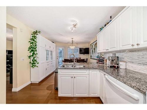 19 Mt Mckenzie Way Se, Calgary, AB - Indoor Photo Showing Kitchen With Double Sink