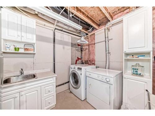 19 Mt Mckenzie Way Se, Calgary, AB - Indoor Photo Showing Laundry Room