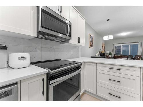 34 Cornerbrook Manor Ne, Calgary, AB - Indoor Photo Showing Kitchen With Upgraded Kitchen