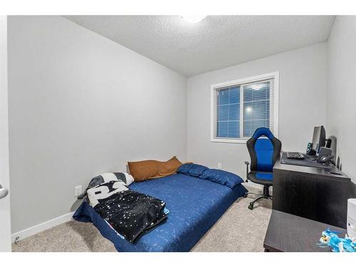 34 Cornerbrook Manor Ne, Calgary, AB - Indoor Photo Showing Bedroom