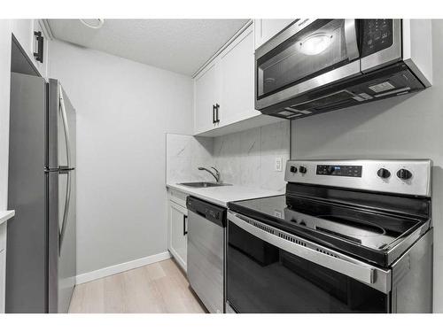 34 Cornerbrook Manor Ne, Calgary, AB - Indoor Photo Showing Kitchen