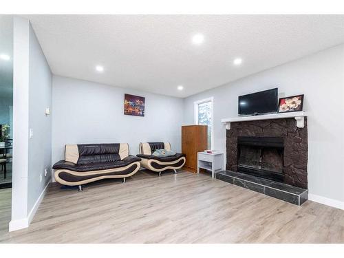 55 Templemont Drive Ne, Calgary, AB - Indoor With Fireplace