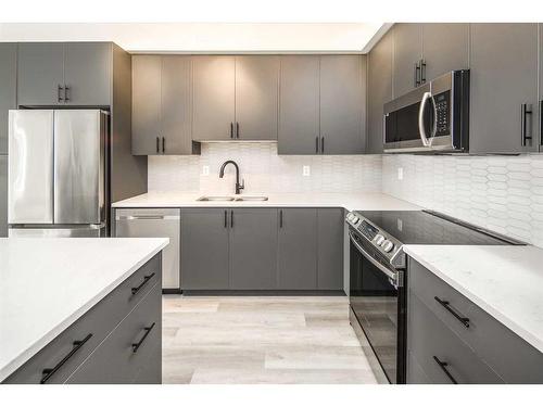 6307-15 Sage Meadows Landing Nw, Calgary, AB - Indoor Photo Showing Kitchen With Stainless Steel Kitchen With Double Sink With Upgraded Kitchen