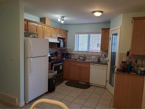 110 Tarawood Lane Ne, Calgary, AB - Indoor Photo Showing Kitchen With Double Sink