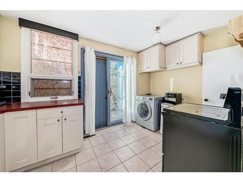 2906 17 Street Sw, Calgary, AB - Indoor Photo Showing Laundry Room