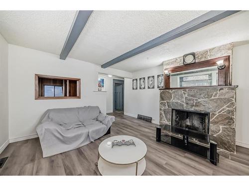 2906 17 Street Sw, Calgary, AB - Indoor Photo Showing Living Room With Fireplace