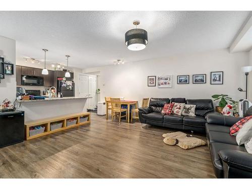 4101-755 Copperpond Boulevard Se, Calgary, AB - Indoor Photo Showing Living Room