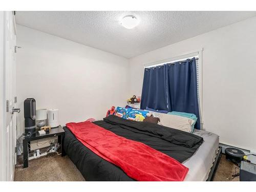 4101-755 Copperpond Boulevard Se, Calgary, AB - Indoor Photo Showing Bedroom