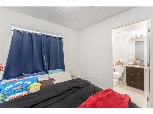 4101-755 Copperpond Boulevard Se, Calgary, AB - Indoor Photo Showing Bedroom