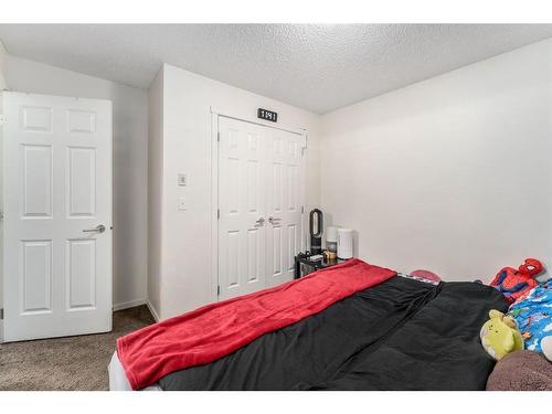 4101-755 Copperpond Boulevard Se, Calgary, AB - Indoor Photo Showing Bedroom