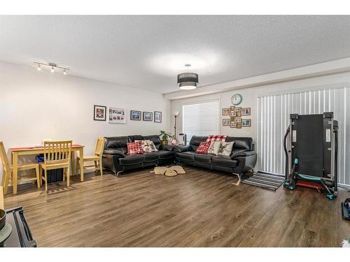 4101-755 Copperpond Boulevard Se, Calgary, AB - Indoor Photo Showing Living Room