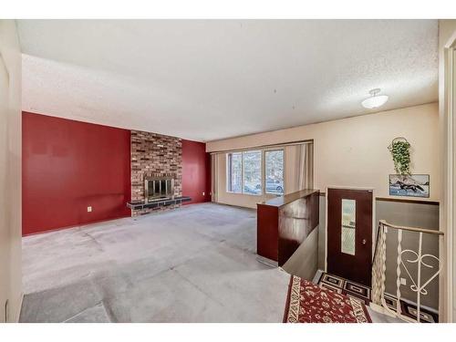 255 Rundleridge Drive Ne, Calgary, AB - Indoor With Fireplace