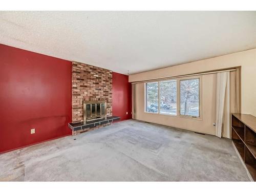 255 Rundleridge Drive Ne, Calgary, AB - Indoor With Fireplace