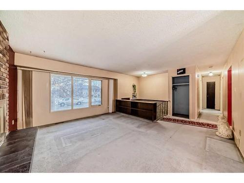 255 Rundleridge Drive Ne, Calgary, AB - Indoor With Fireplace