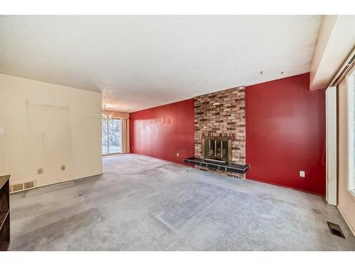 255 Rundleridge Drive Ne, Calgary, AB - Indoor With Fireplace