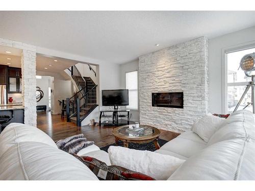 81 Auburn Meadows Crescent Se, Calgary, AB - Indoor Photo Showing Living Room With Fireplace