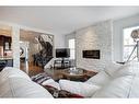 81 Auburn Meadows Crescent Se, Calgary, AB  - Indoor Photo Showing Living Room With Fireplace 