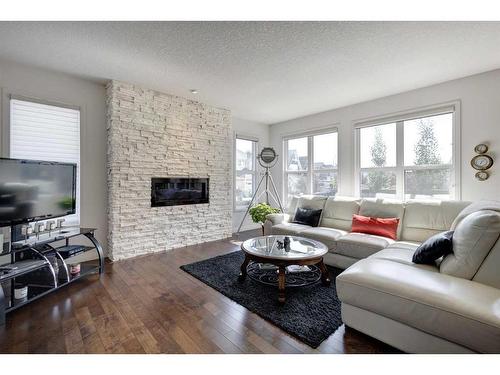 81 Auburn Meadows Crescent Se, Calgary, AB - Indoor Photo Showing Living Room With Fireplace