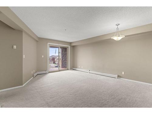 316-15 Saddlestone Way Ne, Calgary, AB - Indoor Photo Showing Other Room