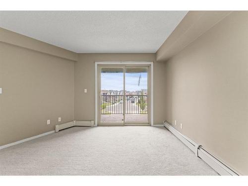 316-15 Saddlestone Way Ne, Calgary, AB - Indoor Photo Showing Other Room